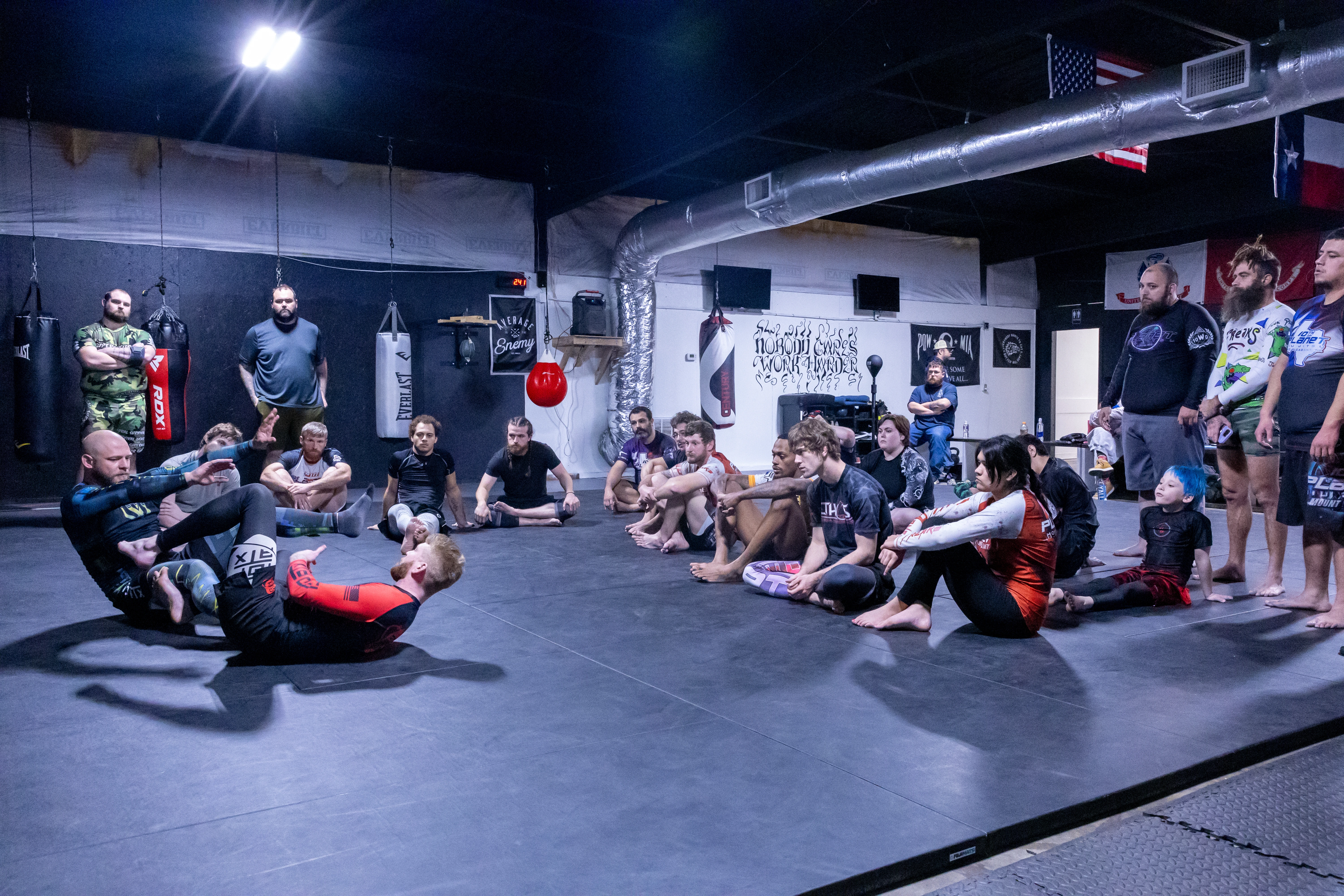 10th Planet Mount Pleasant class in session — coach demonstrating to the team